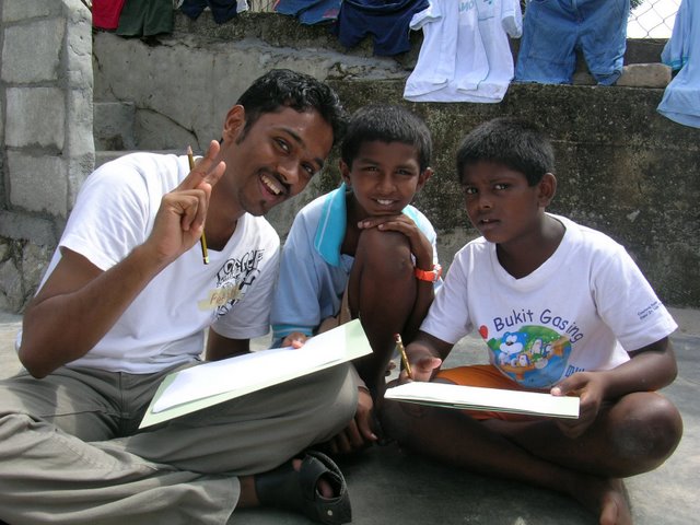 volunteer prakash with nandha and jeeva.